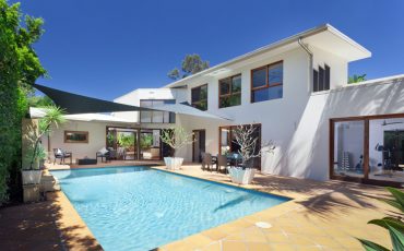 house with pool stock image