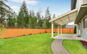 house with a fence stock image
